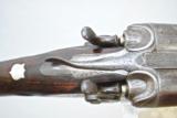 ANTIQUE PARKER DH HAMMER GUN IN 10 GAUGE - 32" BARRELS - CARVED FENCES
- 6 of 20