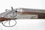 ANTIQUE PARKER DH HAMMER GUN IN 10 GAUGE - 32" BARRELS - CARVED FENCES
- 3 of 20