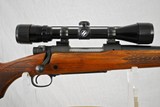 WINCHESTER MODEL 70 IN 30-06 WITH BUSHNELL SCOPE - 1 of 12