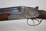 MERKEL 203E LUXUS - 20 GAUGE - DOUBLE TRIGGERS - DEEP GAME SCENE ENGRAVED WITH OAK LEAF CARVED STOCK - OAK AND LEATHER CASE - 2 of 19