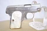 COLT MODEL 1908 - NICKEL WITH FACTORY PEARL GRIPS - 1 of 12