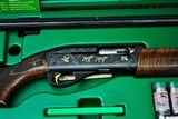 REMINGTON 1100 - 50TH ANNIVERSARY EDITION - UNFIRED WITH CASE AND PAPERWORK - TARGET CONTOUR BARREL - 1 of 16