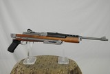 RUGER STAINLESS STEEL MINI 14 WITH ORIGINAL FACTORY HARDWOOD FOLDING STOCK IN 223 - MINT CONDITION AND RARE - 1 of 13