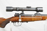 MAUSER 8 X 60 - OCTAGON TO ROUND BARREL - CLAWS AND CURRENT PERIOD SCOPE