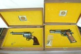 FACTORY ORDERED MATCHED PAIR OF NRA CENTENNIAL COLTS- SINGLE ACTION / MODEL 1911 GOLD CUP - 2 of 16