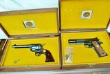 FACTORY ORDERED MATCHED PAIR OF NRA CENTENNIAL COLTS- SINGLE ACTION / MODEL 1911 GOLD CUP - 1 of 16