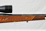 WINSLOW RIFLE IN 243 - BASKETWEAVE CHECKERING - WELL FIGURED WOOD - 11 of 14