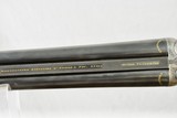 MANUFACTURE LIEGEOISE D'ARMAS - HAMMER SHOTGUN WITH STEEL BARRELS AND PIGEON STYLE RIB WITH GOLD LETTERING - 7 of 11