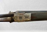 MANUFACTURE LIEGEOISE D'ARMAS - HAMMER SHOTGUN WITH STEEL BARRELS AND PIGEON STYLE RIB WITH GOLD LETTERING - 9 of 11