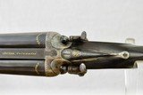 MANUFACTURE LIEGEOISE D'ARMAS - HAMMER SHOTGUN WITH STEEL BARRELS AND PIGEON STYLE RIB WITH GOLD LETTERING - 2 of 11