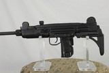 UZI MODEL A WITH FOLDING STOCK - FACTORY CASE AND PAPERWORK - 1 of 11