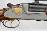 JOSEPH HAMBRUSCH - HAND DETACHABLE SIDELOCK DOUBLE RIFLE - ENGRAVED WITH GOLD ANIMALS