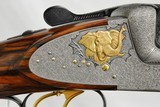 JOSEPH HAMBRUSCH - HAND DETACHABLE SIDELOCK DOUBLE RIFLE - ENGRAVED WITH GOLD ANIMALS