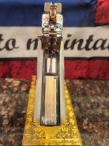 Unbelievable Mirrored Nickel& Rose Gold Super Polished Colt 1911 .45 ACP National Match, Gold Cup.
70 - 7 of 16