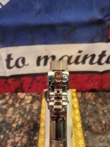 Unbelievable Mirrored Nickel& Rose Gold Super Polished Colt 1911 .45 ACP National Match, Gold Cup.
70 - 6 of 16
