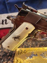 Unbelievable Mirrored Nickel& Rose Gold Super Polished Colt 1911 .45 ACP National Match, Gold Cup.
70 - 8 of 16