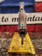 Unbelievable Mirrored Nickel& Rose Gold Super Polished Colt 1911 .45 ACP National Match, Gold Cup.
70 - 10 of 16