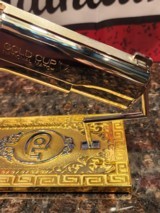 Unbelievable Mirrored Nickel& Rose Gold Super Polished Colt 1911 .45 ACP National Match, Gold Cup.
70 - 9 of 16