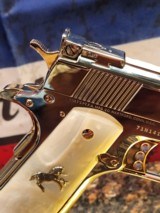 Unbelievable Mirrored Nickel& Rose Gold Super Polished Colt 1911 .45 ACP National Match, Gold Cup.
70 - 2 of 16