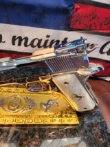 Unbelievable Mirrored Nickel& Rose Gold Super Polished Colt 1911 .45 ACP National Match, Gold Cup.
70 - 14 of 16