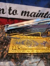 Unbelievable Mirrored Nickel& Rose Gold Super Polished Colt 1911 .45 ACP National Match, Gold Cup.
70 - 15 of 16