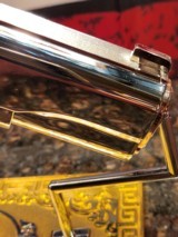 Unbelievable Mirrored Nickel& Rose Gold Super Polished Colt 1911 .45 ACP National Match, Gold Cup.
70 - 4 of 16