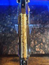 One of kind Beretta .40 S&W 24k Gold small parts and barrel, engraved barrel with black nickel polished finish. - 9 of 14