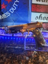 One of kind Beretta .40 S&W 24k Gold small parts and barrel, engraved barrel with black nickel polished finish. - 1 of 14