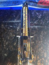 One of kind Beretta .40 S&W 24k Gold small parts and barrel, engraved barrel with black nickel polished finish. - 2 of 14