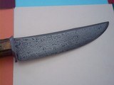 James L. Batson,Jr Moran the Pirate Bowie carved by Paul G. Grussenmeyer Damascus 