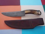 James L. Batson,Jr Moran the Pirate Bowie carved by Paul G. Grussenmeyer Damascus 