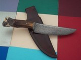 James L. Batson,Jr Moran the Pirate Bowie carved by Paul G. Grussenmeyer Damascus 