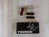 Taurus PT 92 AFS, 9mm Stainless Gold & Rosewood 17+1, 1 extra 18rd mag - 1 of 12