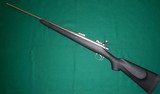 Remington 700 Stainless Mountain Rifle with Titanium Rifle Stock 30-06 - 2 of 13