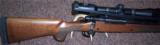 Remington 700 CDL 7mm Rem. Mag. with Zeiss 4-14X Scope - 1 of 4