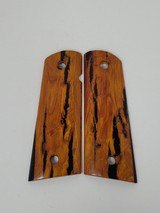 Highfiguregrips
Distressed Amber Redwood 1911 Magwell grips - 1 of 1