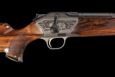 Blaser R8 375. H&H with 300 Win Barrel Factory Engraved Game Scene - Image 1 of 4