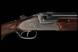 Factory Engraved Left Handed Johann Fanzoj Hand Detachable Sidelock Over/Under Combination 16ga/.222 Gun Two Barrel Set with Two Scopes - Image 1 of 5