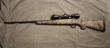 Remington 783 7mm Remington Magnum Camo Bolt Action - 1 of 5