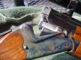 Merkel 210E Combination Gun w/ Schmidt & Bender Scope in Claw Mounts
- 9 of 15