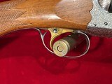 Ithaca Model 200e 12 gauge engraved. - 6 of 12