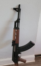 Zastava M70, Very good to excellent condition. 7.62x39, dark walnut furniture, 2 mags and hard case included