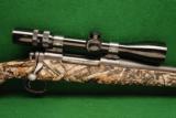 Remington Model 700 SPS Woodland Camo 7mm Remington Magnum - 1 of 6