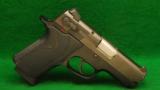 Smith & Wesson Model 4014 40 Caliber Pistol - 1 of 2