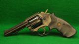Smith & Wesson Model 10 HB Caliber 38 Special DA Revolver - 1 of 2