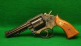 Smith & Wesson Model 10 HB Caliber 38 Special DA Revolver - 1 of 3