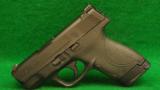 NEW Smith & Wesson M&P 40 Shield Caliber 40 S&W Pistol - 1 of 2