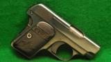 Colt Model 1908 Caliber 25 ACP Hammerless Automatic Pistol (Vest Pocket) - 1 of 2