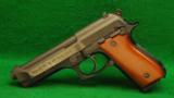 Taurus Model PT92AF Caliber 9mm Luger DA Pistol - 1 of 2