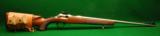 Browning Model T-Bolt Stainless/ Walnut Caliber 22 LR Rifle - 1 of 9